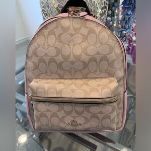 Pink and signature beige coach backpack!